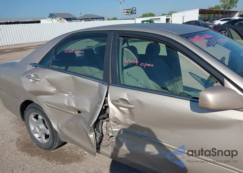2006 Toyota Camry Le from USA, damaged, VIN 4T1BE32K06U718266